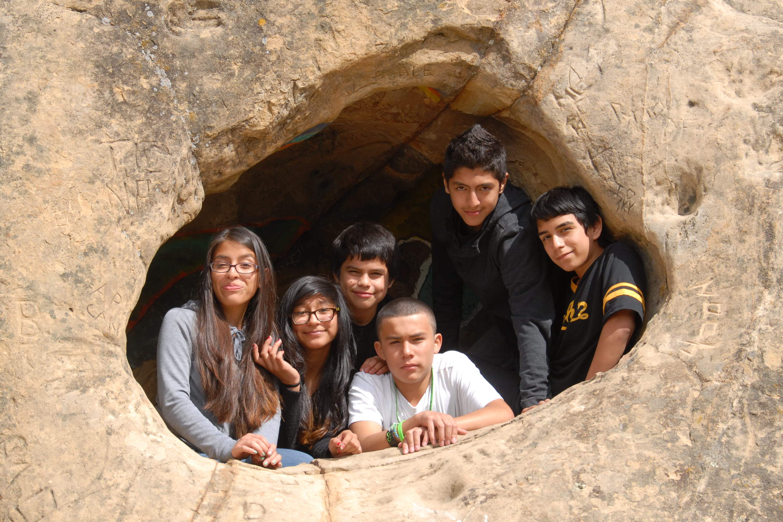 ESCAPE Club students in a wind cave at Rock City